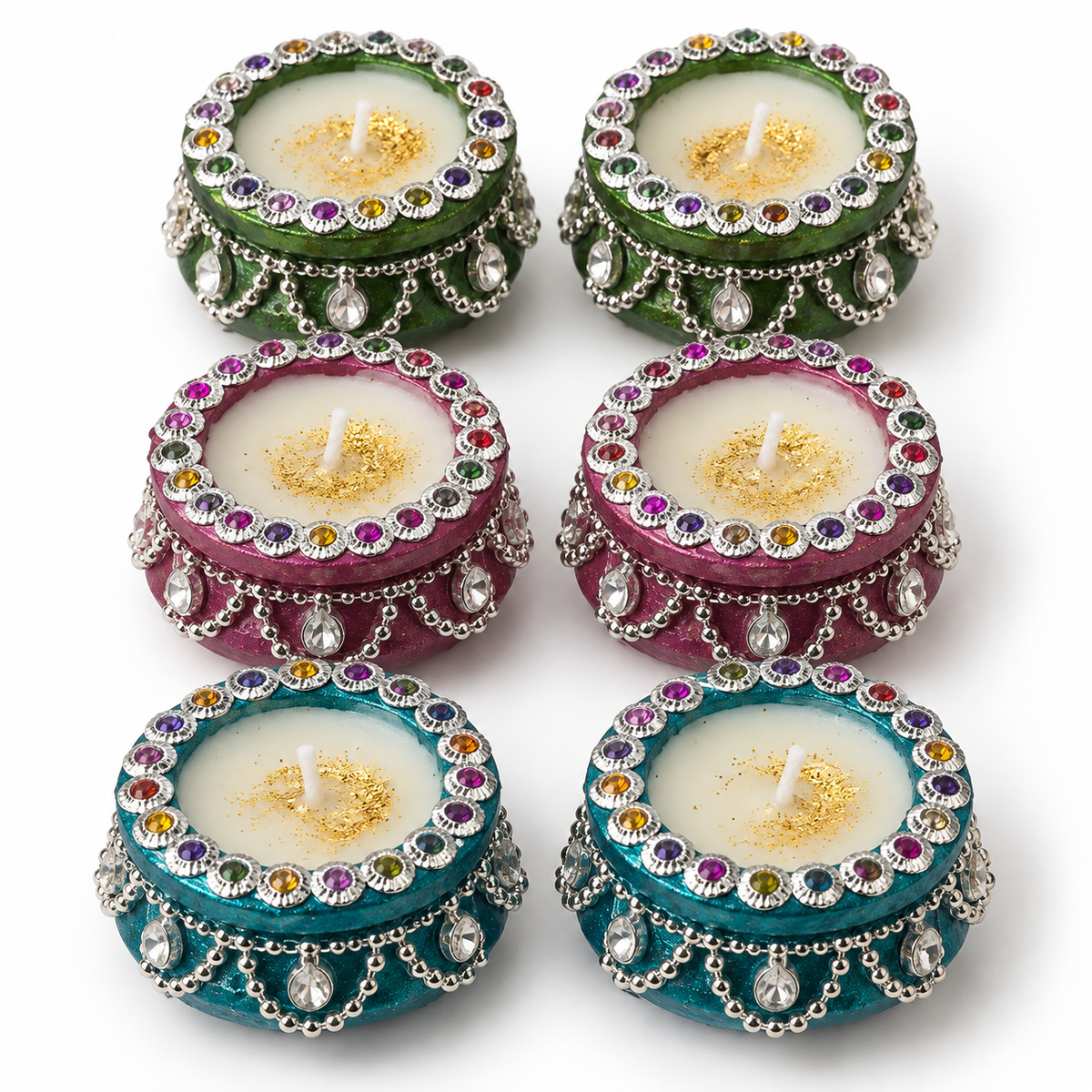 Six decorative tealight candles arranged in two columns of three on a white background. Each candle has a colorful outer ring with silver-tone rhinestone trim and hanging bead chains.